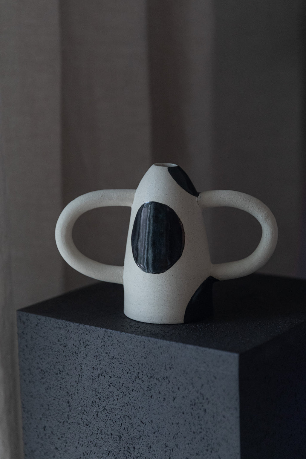In Arms Vase